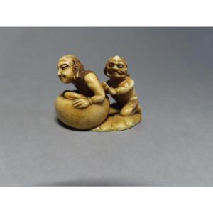 Ivory Netsuke. Oni Washing A Man. Japan, Meiji Period (1868-1912)