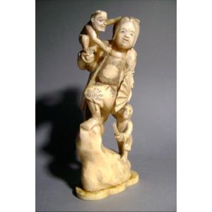 Ivory Okimono. Okame The Oni And The Monkey. Japan Late 19th Century