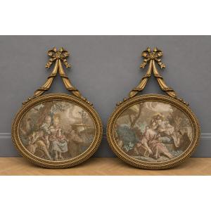 Pair Of Oval Wall Medallions In Carved And Gilded Wood