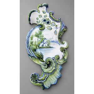 Wall-mounted Earthenware Bouquetiere With Polychrome Decoration, In An Animated Form.