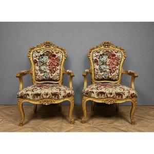 Pair Of Louis XV-style Cabriolet Armchairs In Carved And Gilded Wood