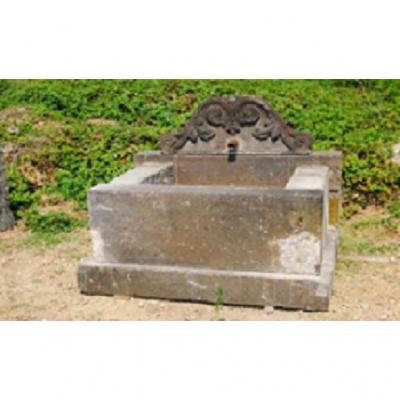 Ancient Fountain In Volcanic Black Stone