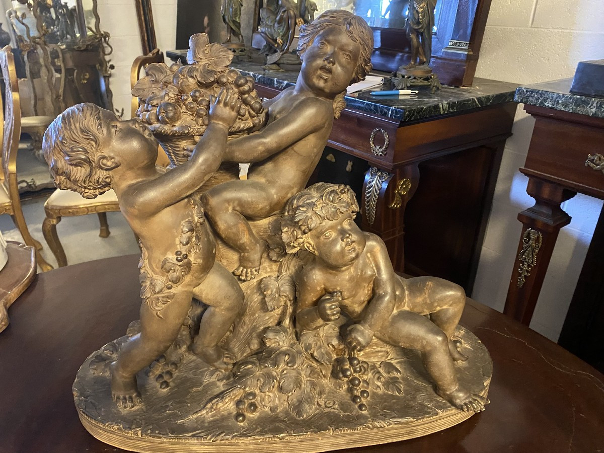 GRUPPO IN TERRACOTTA RAFFIGURANTE GIOCHI DI PUTTI