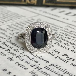 Art Deco Platinum Ring, Set With A Sapphire And Diamonds 