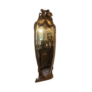 Gilded Wooden Mirror From The Napoleon III Period, Bird Sculpture. Beveled Mirror.
