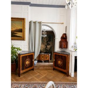 A Pair Of Louis XVI-era Corner Pieces Decorated With Motifs Representing The Sciences And Geography.   