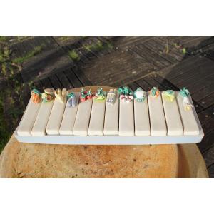 Series Of 12 Barbotine Knife Holders