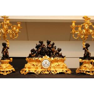 Large Pendulum Clock And Set Of Very Fine Quality And Signed Candlesticks.