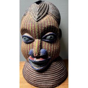 Cameroon Bamileke Mask Of A Princess With Vertical Beads On A Wicker Base Circa 1910