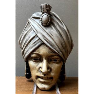 R Scali Pair Of Patinated Plaster Masks Representing A Couple Of Fakirs