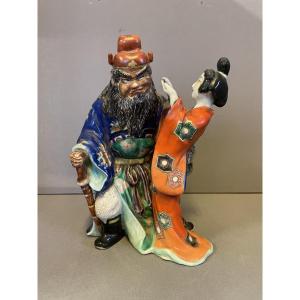 Shōki And His Servant, A Polychrome Porcelain Figurine 