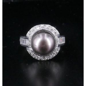 White Gold Ring With Black Pearl And Baguette Diamonds