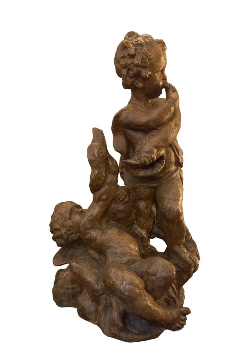 Putti con delfino, terracotta