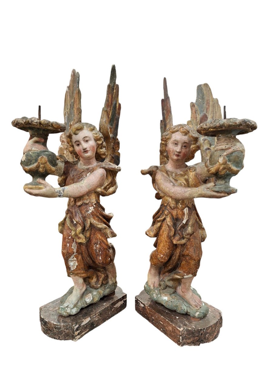 Coppia di angeli genuflessi portacero