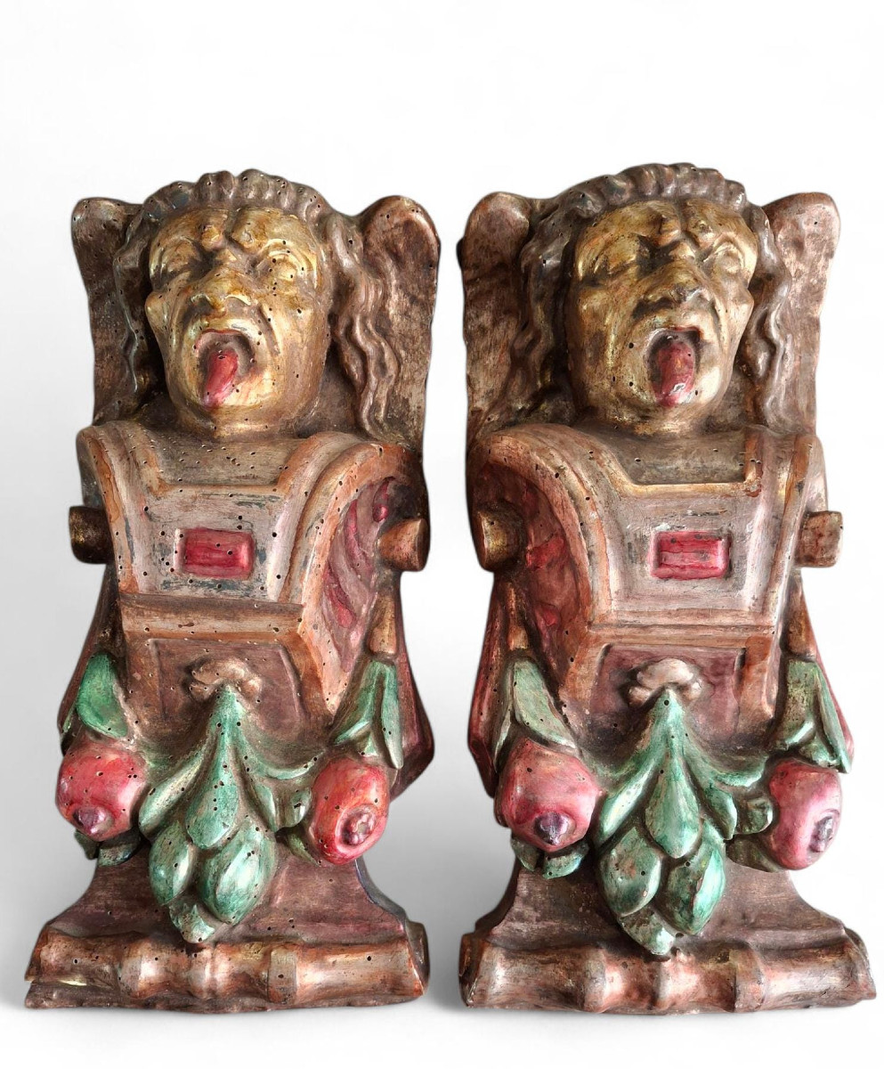 Coppia di sculture a lesena in legno