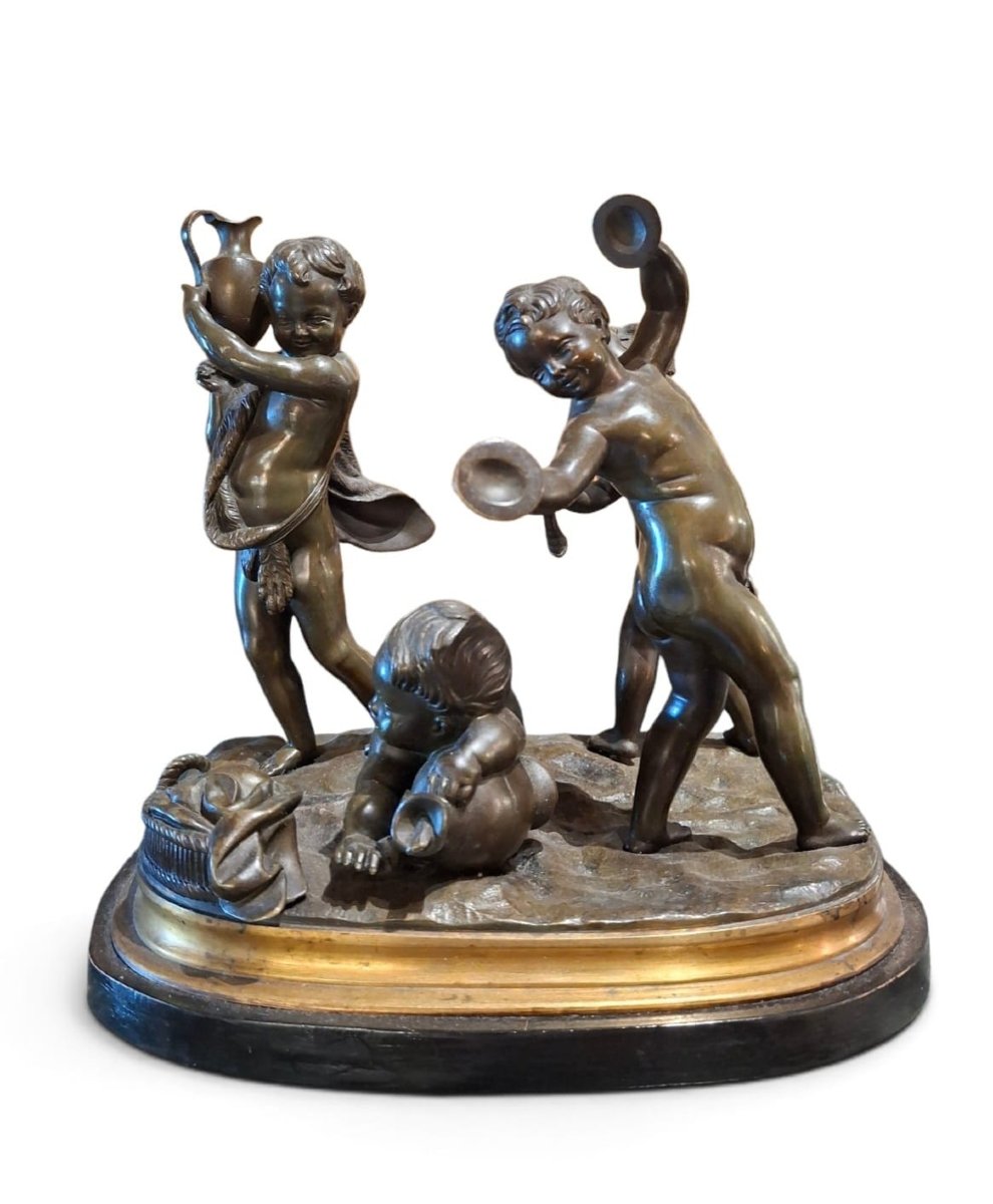 Gruppo in bronzo raffigurante putti-photo-1