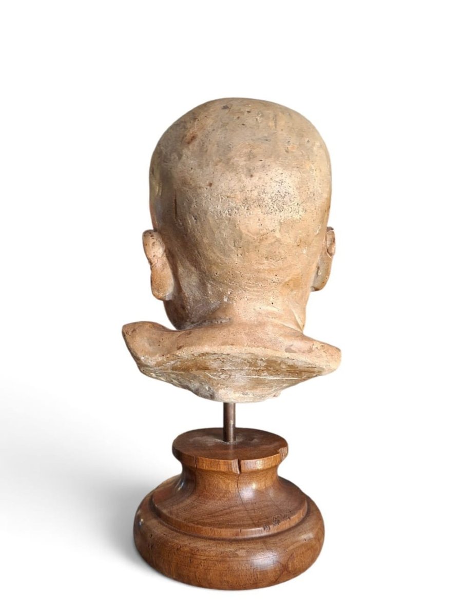 Testa di bambino in terracotta-photo-1