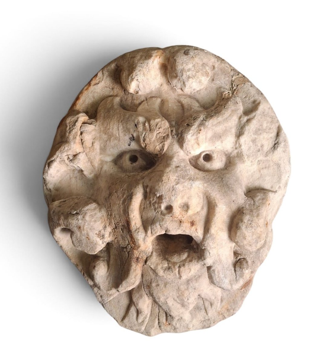 Mascherone da fontana raffigurante volto grottesco