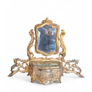 Piccolo specchio da toeletta