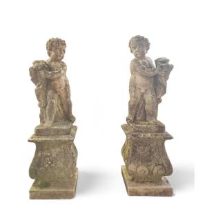 Coppia di putti in pietra di Vicenza con basi