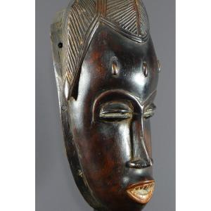 Ivory Coast, Gouro People, 1940s/1950s, Female Gu Dance Mask In Hardwood.