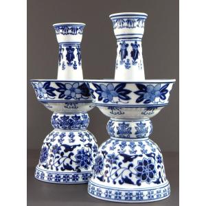 China, 1960s/1970s, Pair Of Porcelain Candlesticks Featuring A Rich Floral Decoration.