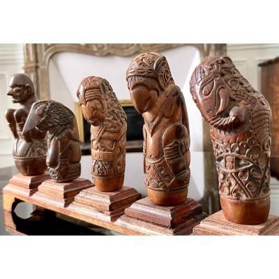 Indonesia, XIXth Century, Five Handles Of Kriss In Carved Wood Anthropo-zoomorphic Decor.