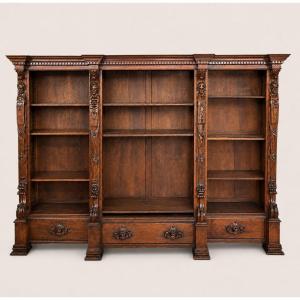 Importante libreria monumentale in noce scolpito, gusto Rinascimento, XIX secolo