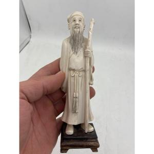Chinese Ivory Sculpture Representing A Man With A Large Cane