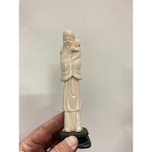 Small Ivory Statuette Representing An Old Man And A Child