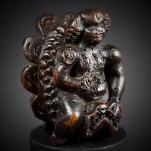 Putto Riding A Dolphin, Patinated Carved Wooden Figurine, 17th Century