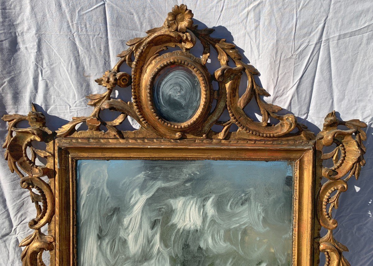 Specchiera in legno intagliato e dorato. Venezia, XVIII secolo.-photo-3