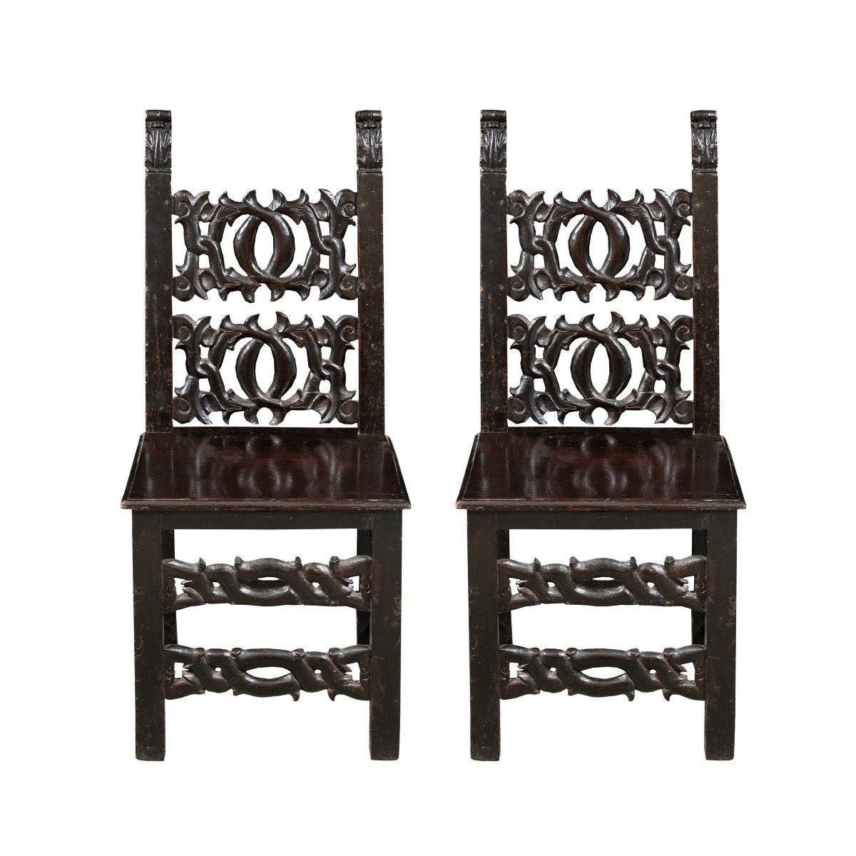 Coppia di sedie fratine in legno intagliato. Modena, XIX secolo. 