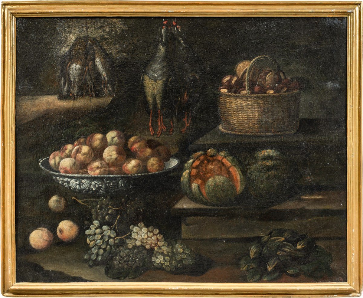 Maestro italiano (inizi XVII sec.) - Natura morta con frutta, verdura e cacciagione.