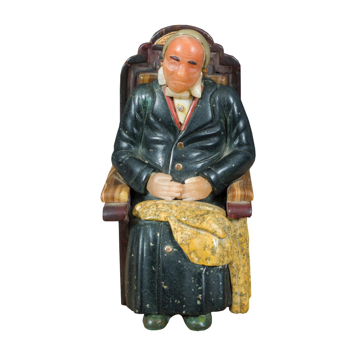 Piccola scultura in marmi diversi e pietre dure - Anziano seduto. Probabilmente Russia, XIX-XX