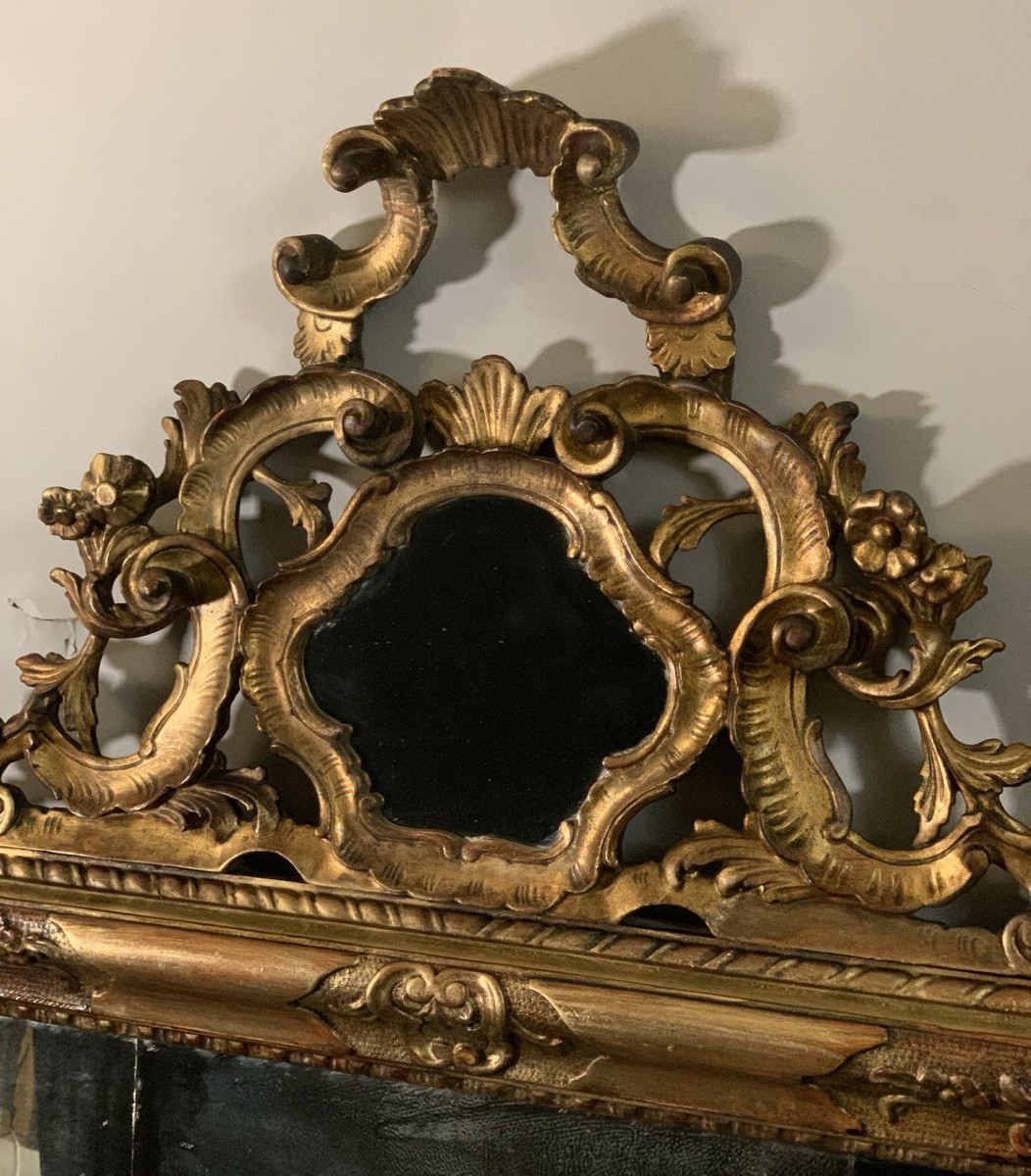 Grande specchiera in legno intagliato e dorato. Venezia, XVIII-XIX secolo.-photo-4