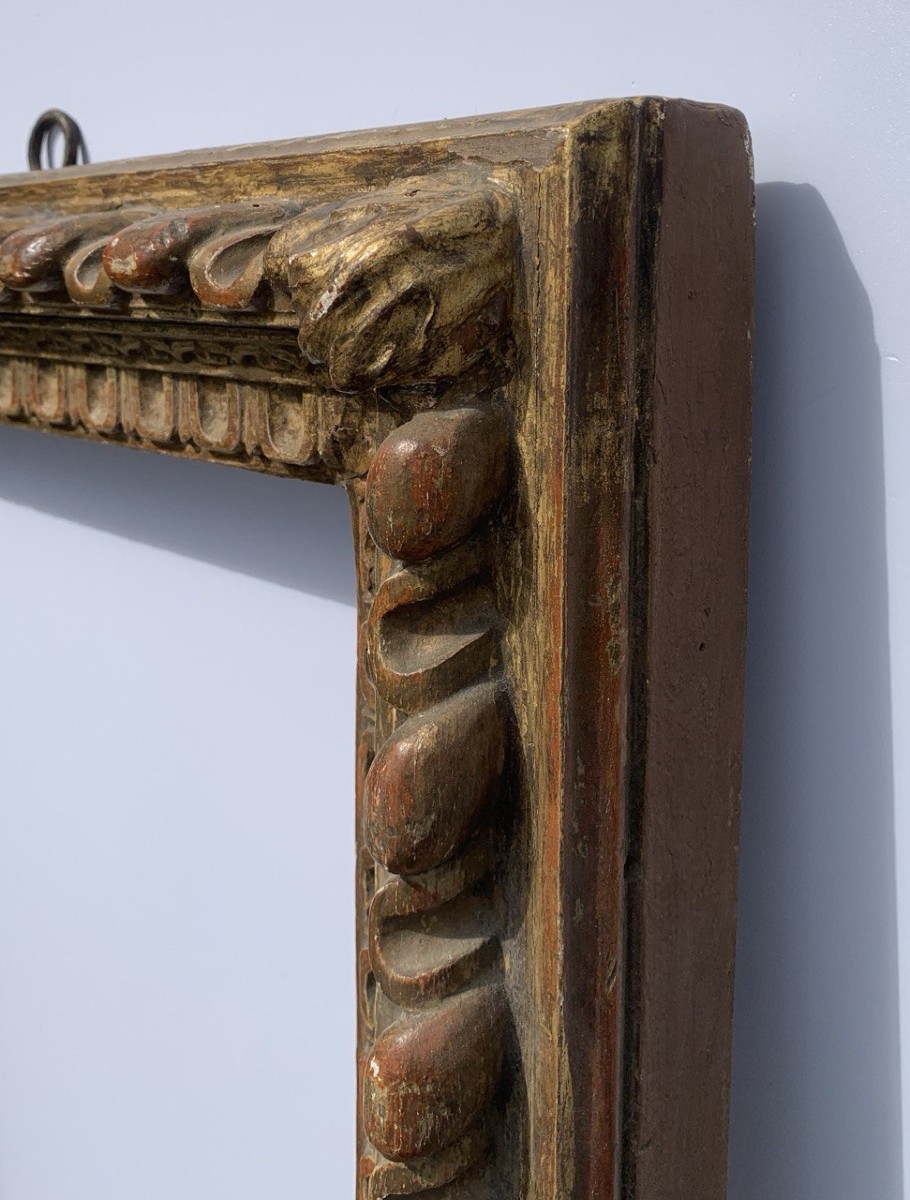 Cornice barocca in legno intagliato e dorato. Toscana, XVII secolo.-photo-2