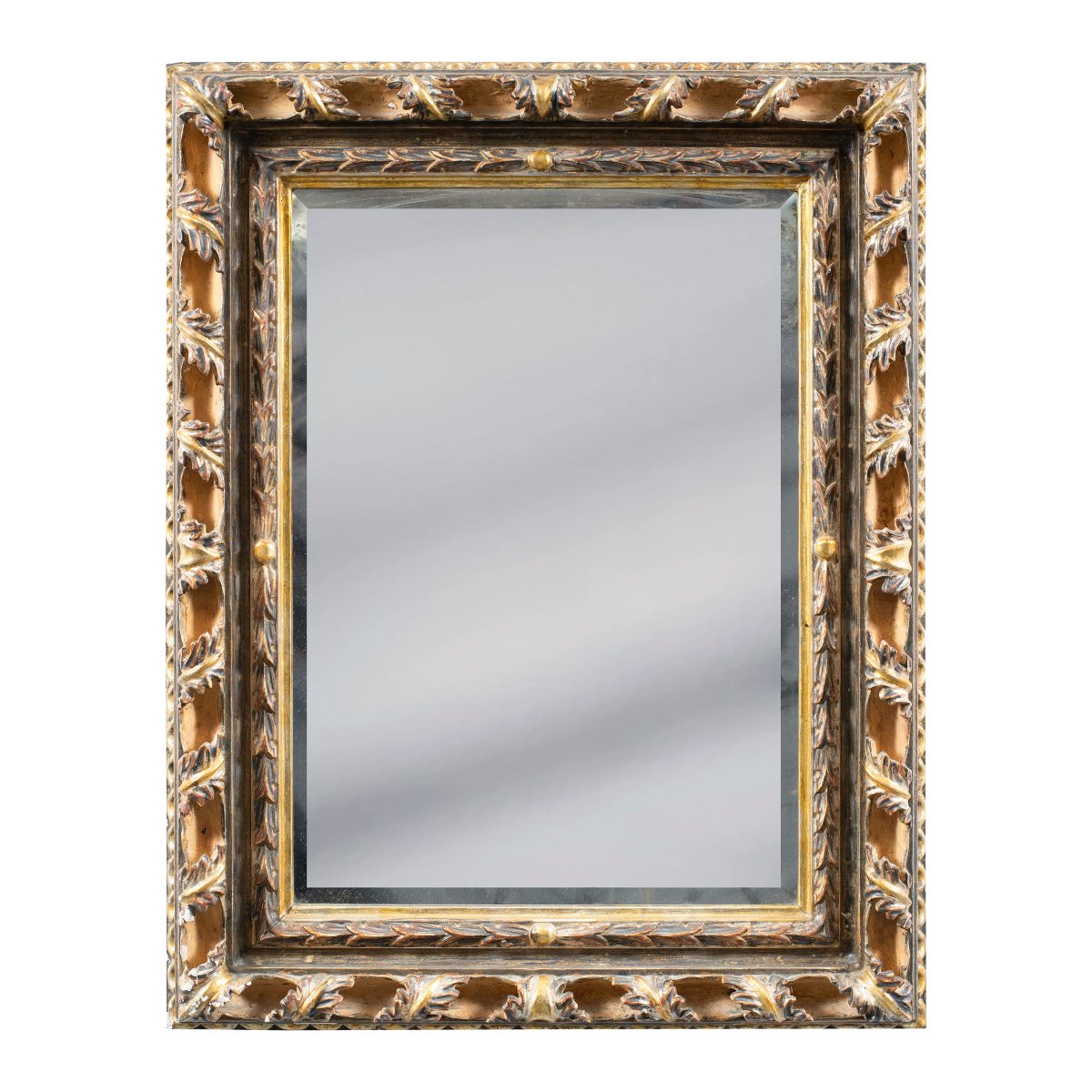 Specchiera Liberty in legno intagliato e dorato. Italia, XX secolo.