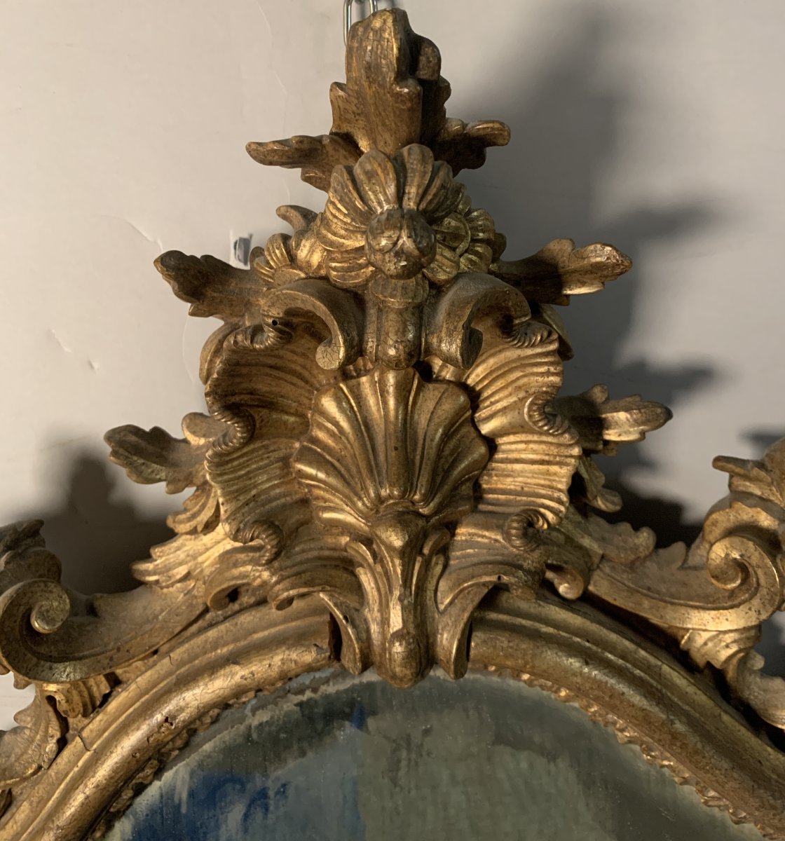 Specchiera in legno intagliato e dorato. Italia settentrionale, XVIII secolo.-photo-2