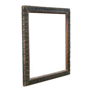 Cornice in legno intagliato, laccato e dipinto a finto marmo. Italia, XVIII secolo.