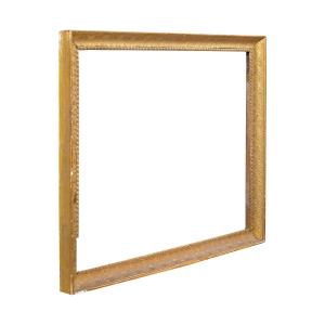 Cornice neoclassica in legno intagliato e dorato. Italia, inizi XIX secolo.