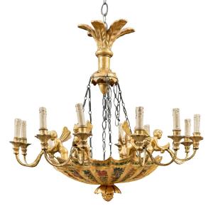 Lampadario a dieci luci in legno intagliato, dorato e dipinto. Vienna, inizi XIX secolo.