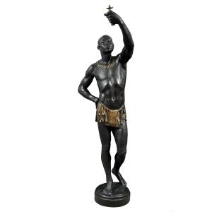 Scultura in legno intagliato, laccato e dipinto - Moro reggi torcia. Venezia, XIX secolo.