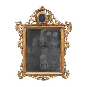 Specchiera in legno intagliato e dorato. Venezia, seconda metà XVIII secolo.