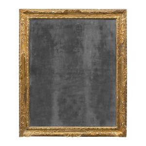 Specchiera in legno intagliato e dorato. Venezia, XVIII secolo.