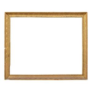 Cornice neoclassica in legno intagliato e dorato. Italia, inizio XIX secolo.