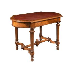 Tavolino lastronato in noce con piano in cuoio - Italia, XIX secolo.