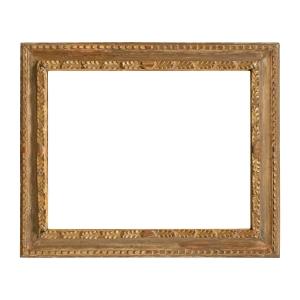 Cornice in legno intagliato e dorato con specchiera. Fine XIX secolo.