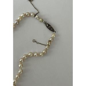 1878a- Falling Pearl Necklace. Ogive Clasp Gray Gold White Stones