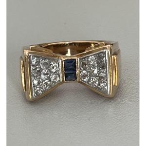 6502- Tank Ring In Yellow And Grey Gold With Calibrated Sapphires And Diamonds